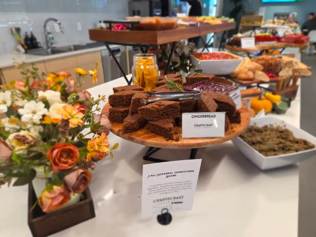Tiered corporate catering display with signage